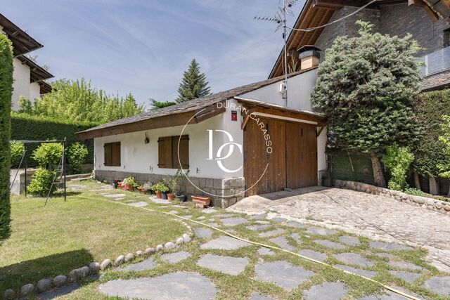 A Centenary Gem in Puigcerdà with Garden, Views, and Tons of Potential